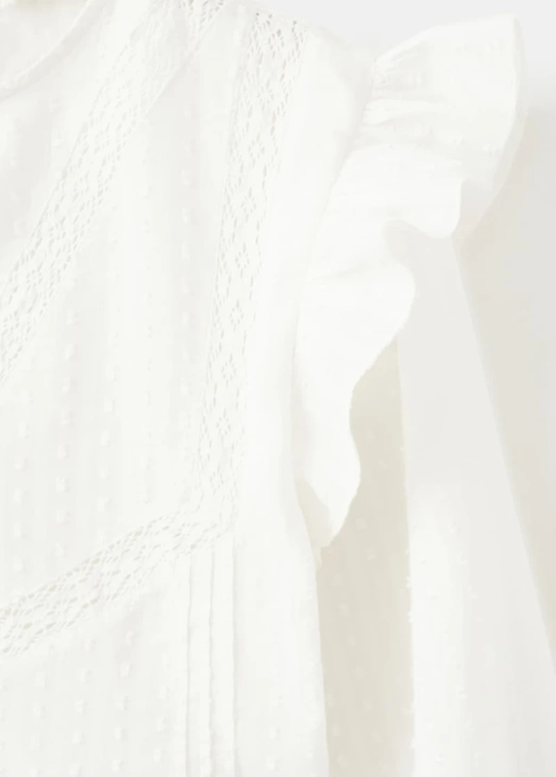 Ruffled plumeti blouse