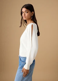 Knitted sweater with cut-out
