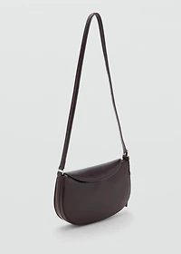 Oval shoulder bag with flap