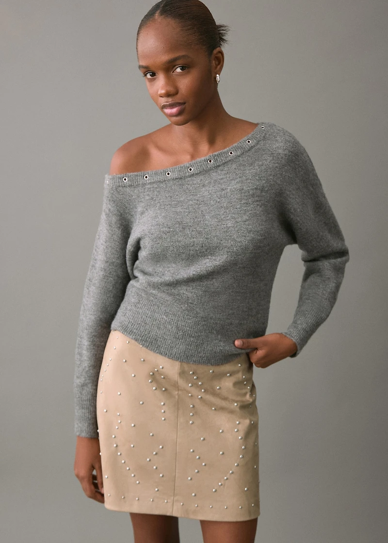 Asymmetrical studded sweater