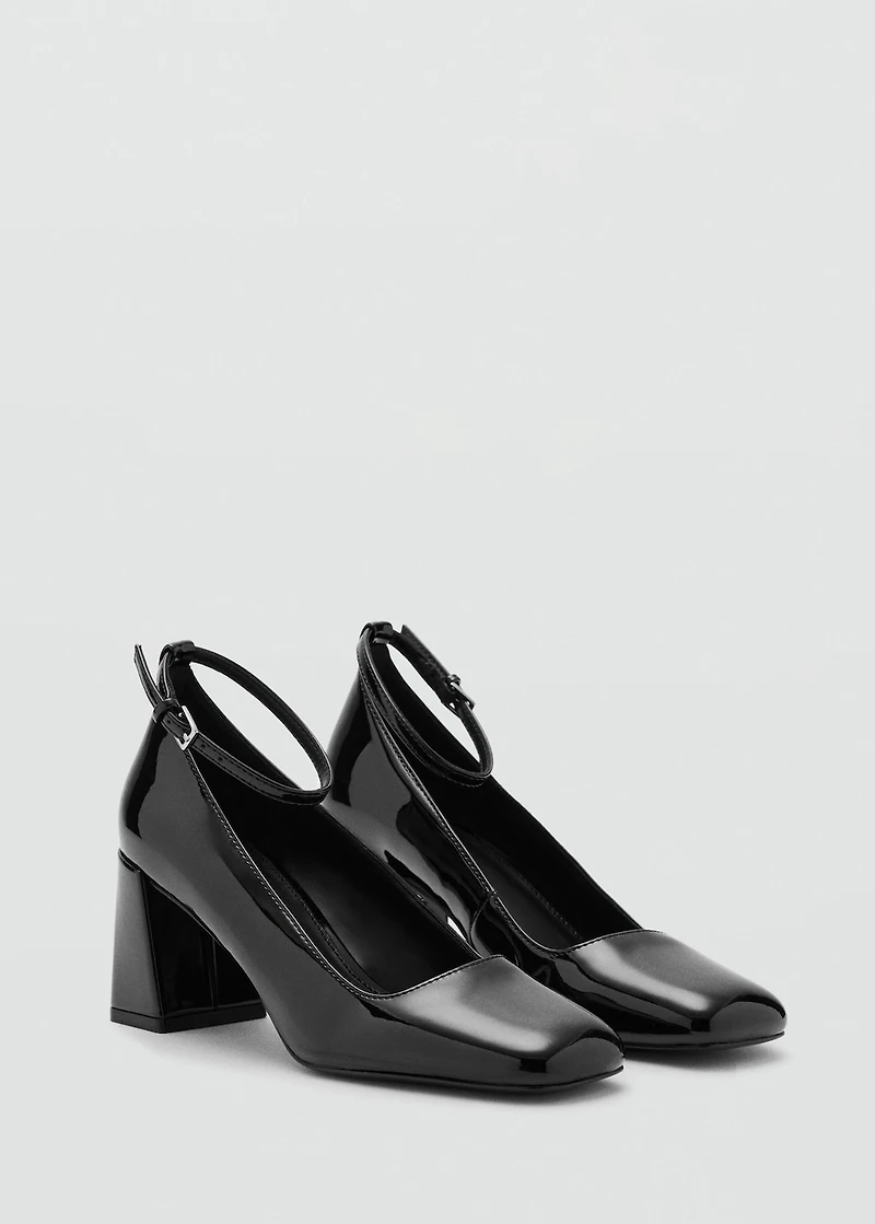 Patent leather high-heeled shoes with ankle straps