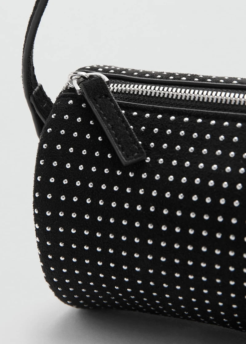 Oval studded shoulder bag