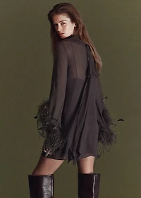 Feathered dress with bell sleeves