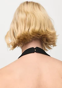 Halter-neck vest with buttons