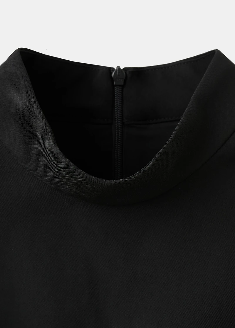 Dress with metal embellishment and cut-out