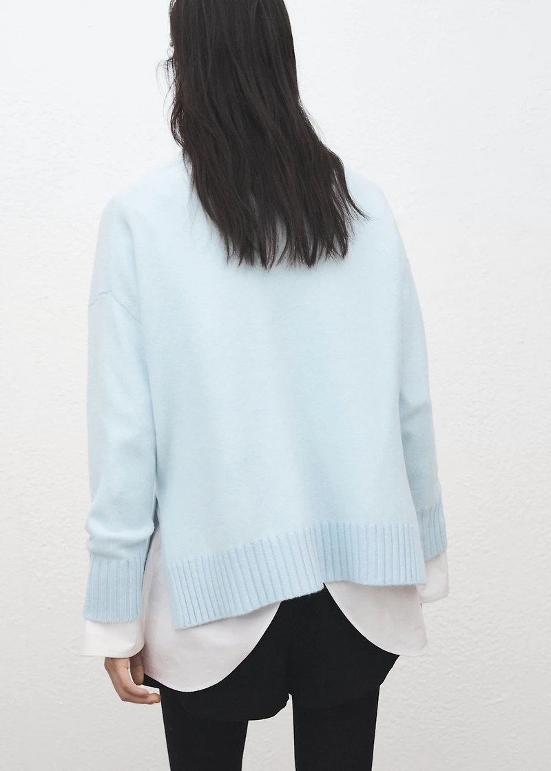 Knitted sweater with openings