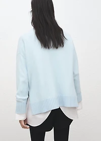 Knitted sweater with openings