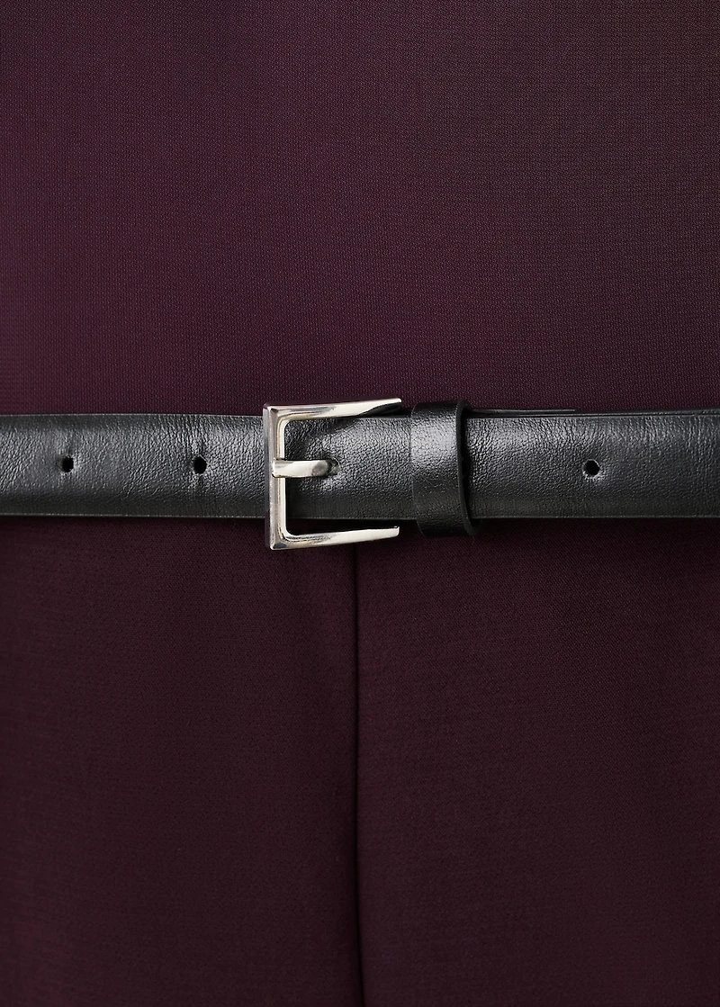 Jumpsuit with asymmetrical neckline and belt