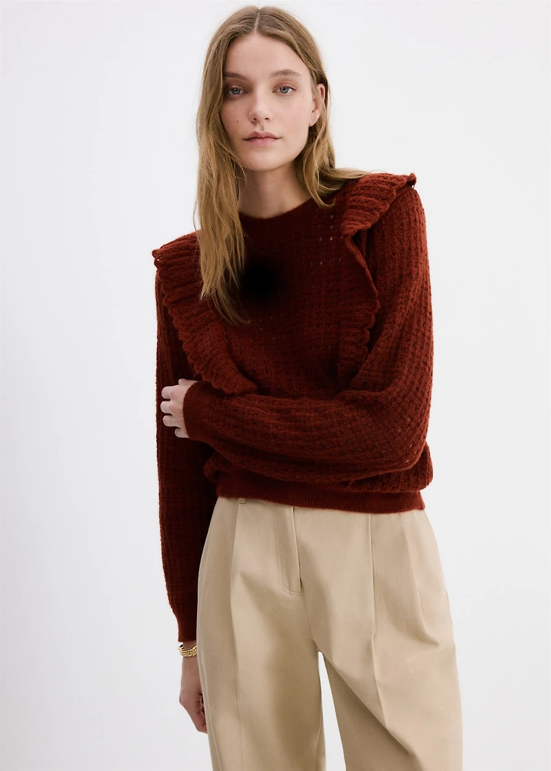 Openwork knitted sweater with ruffles