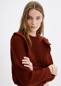 Openwork knitted sweater with ruffles