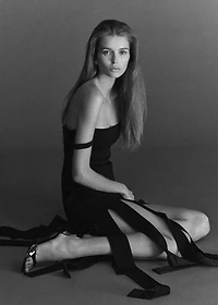 Low-cut dress with fringed hem