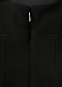 Low-cut dress with fringed hem