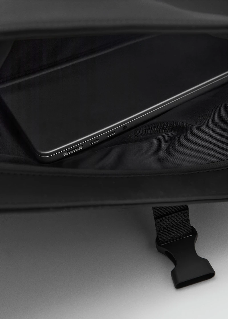 Rubberized backpack with flap closure