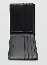 Wallet with embossed effect