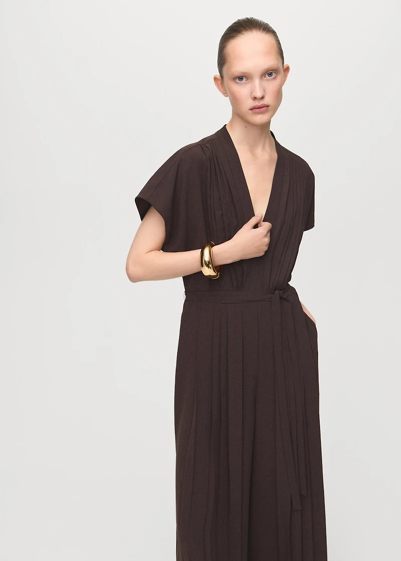 Pleated jumpsuit with belt