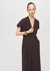 Pleated jumpsuit with belt
