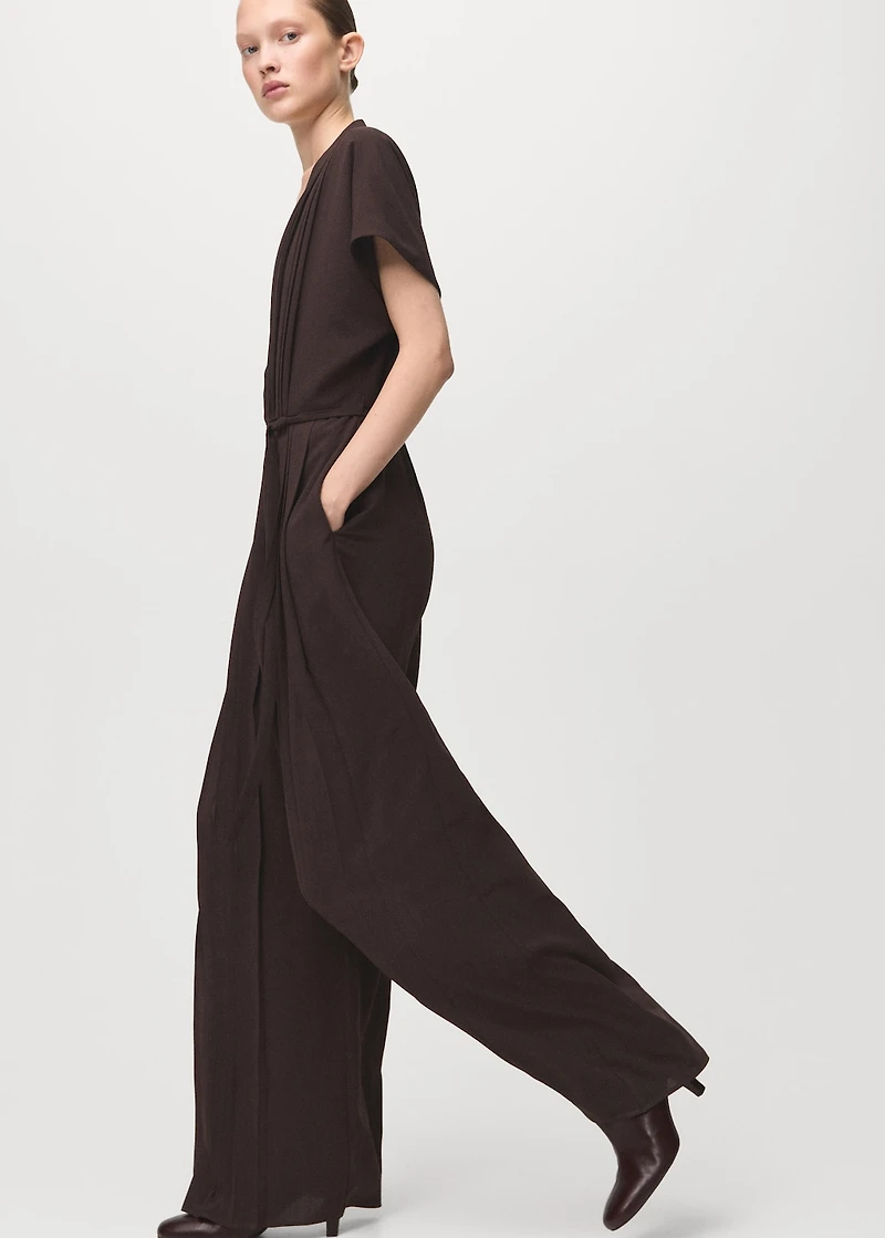 Pleated jumpsuit with belt