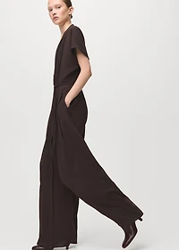 Pleated jumpsuit with belt