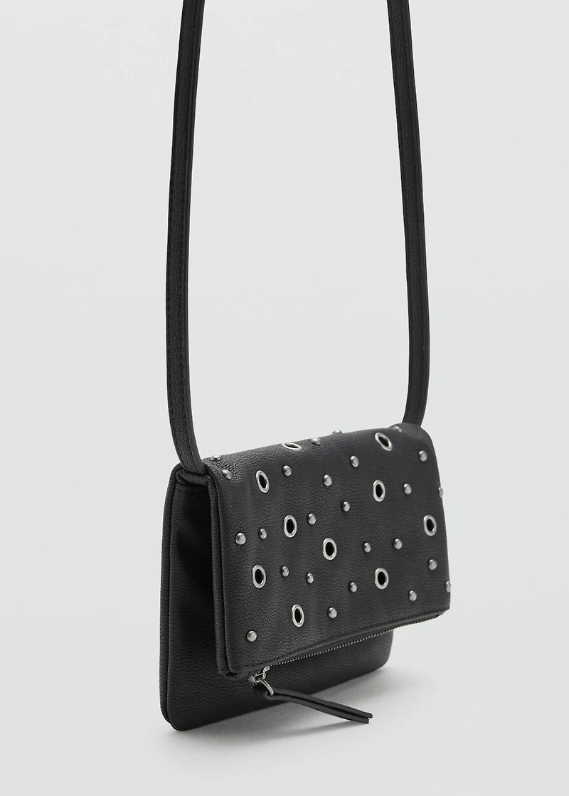 Studded clutch bag