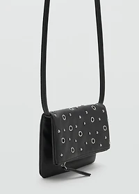 Studded clutch bag