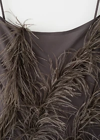 Feather dress with fringed hem