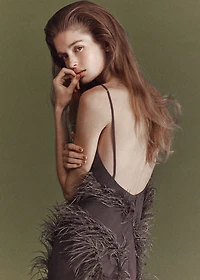 Feather dress with fringed hem