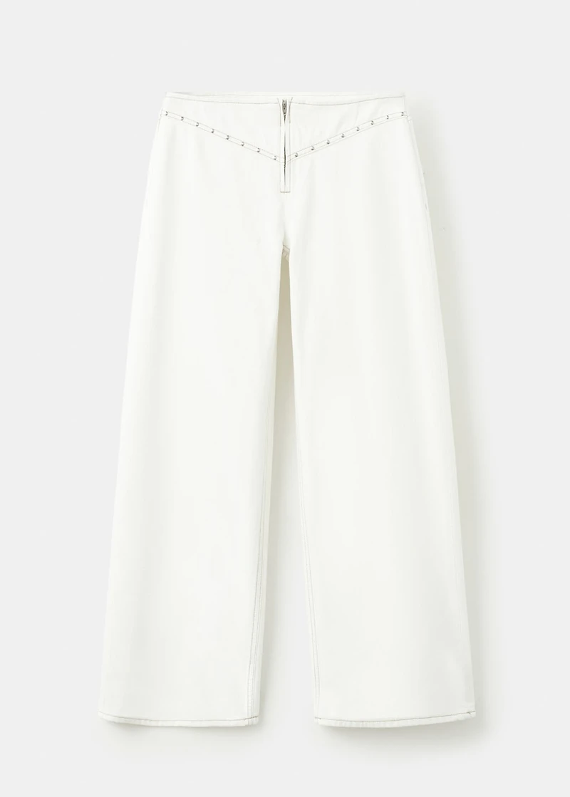 Low-waist studded jeans