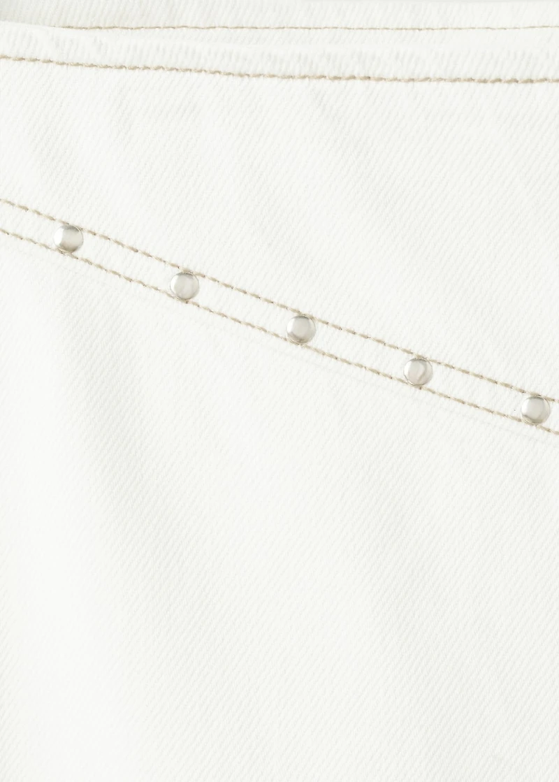 Low-waist studded jeans