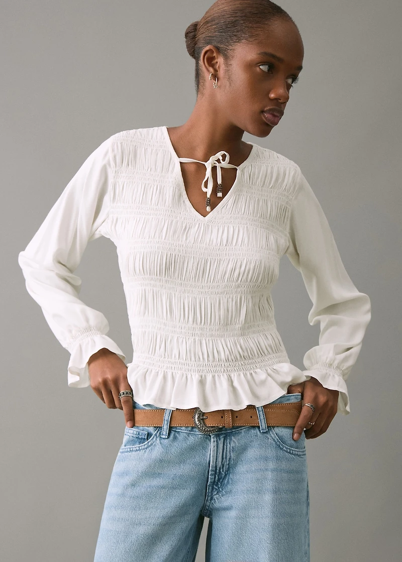 Ruched blouse with ruffles