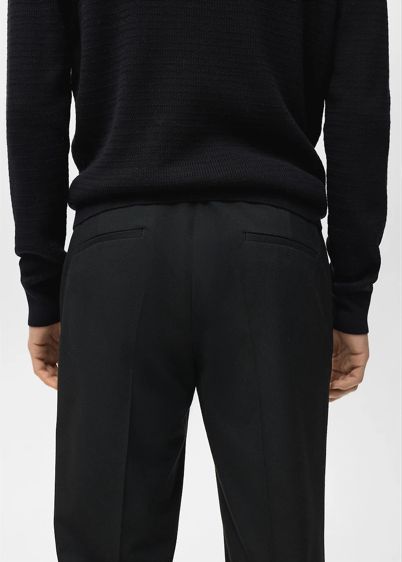 Pleated slim-fit pants