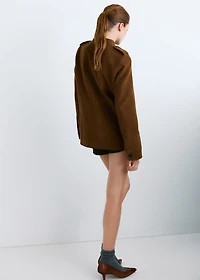 Collarless jacket with pockets