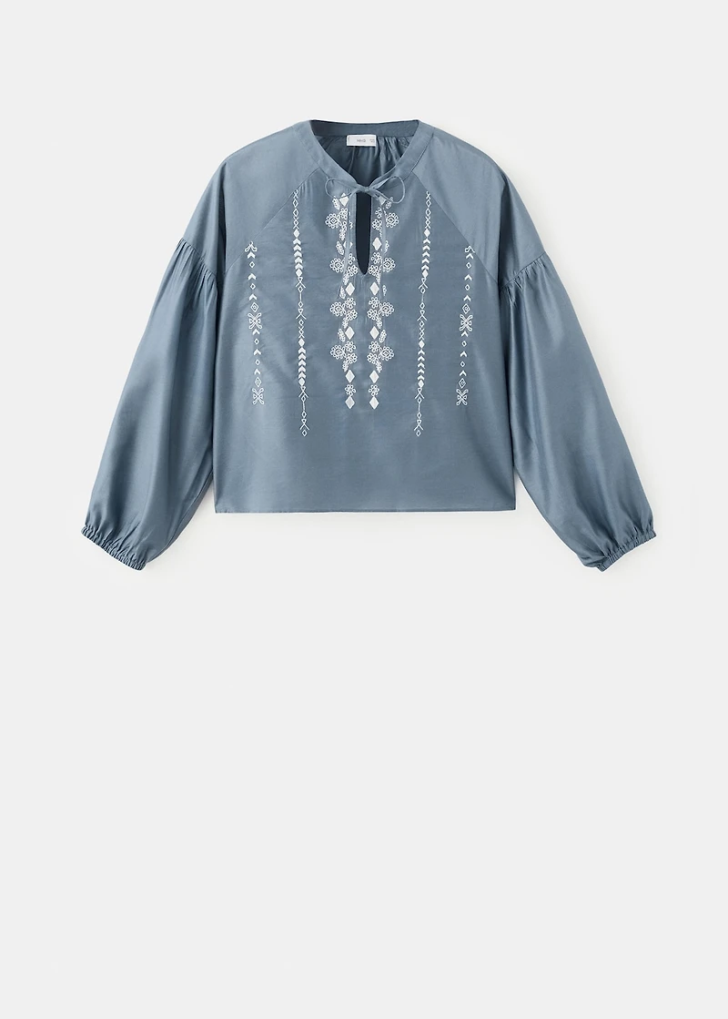 Embroidered blouse with bow