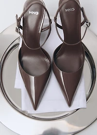 Patent heeled shoes