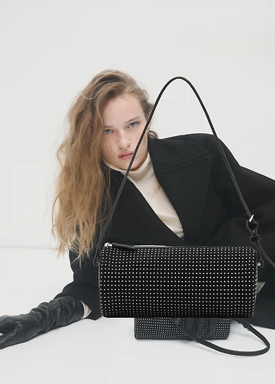 Oval studded shoulder bag