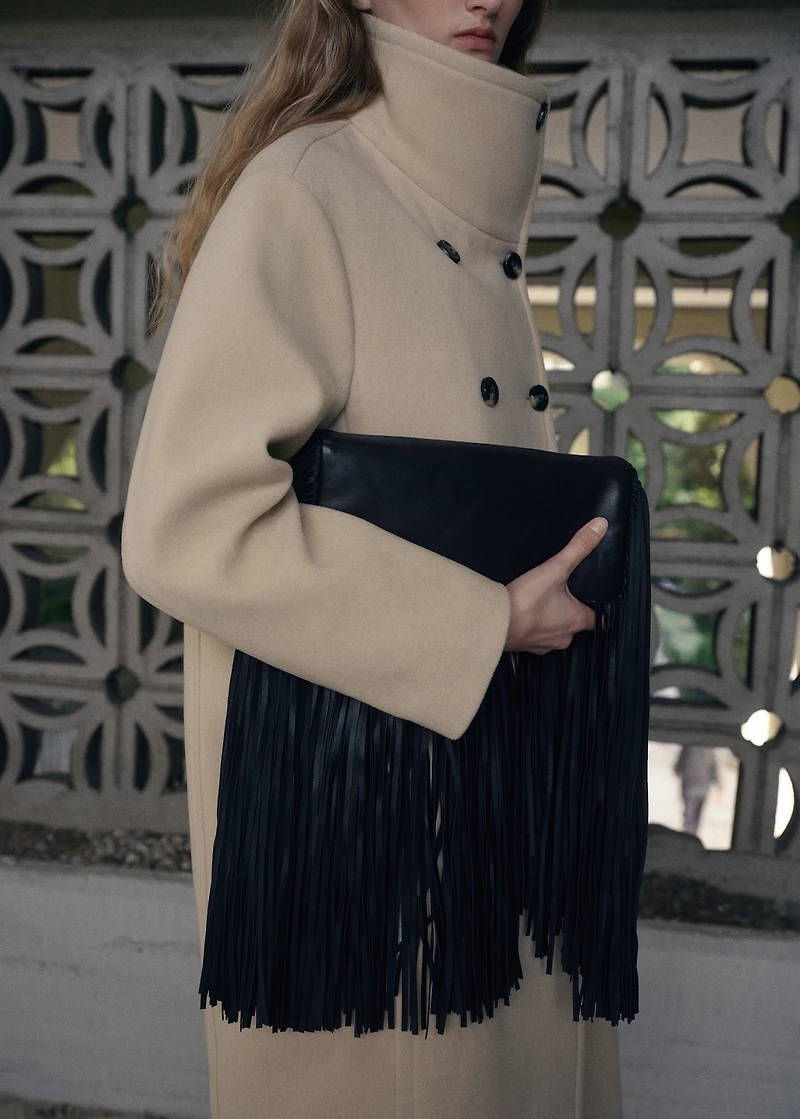 Leather handbag with fringes