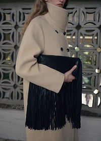 Leather handbag with fringes