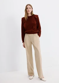 Openwork knitted sweater with ruffles