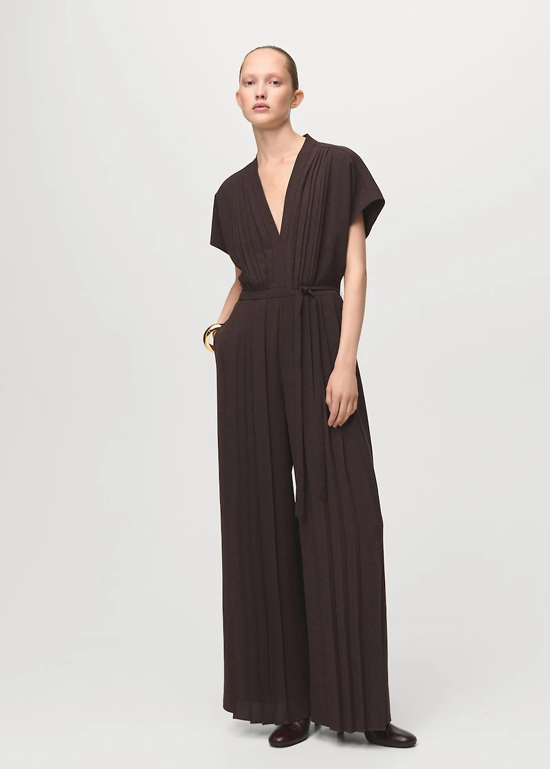 Pleated jumpsuit with belt