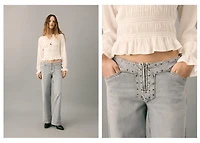 Low-waist studded jeans