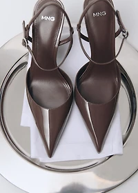 Patent heeled shoes