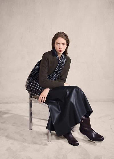 Oval studded shoulder bag