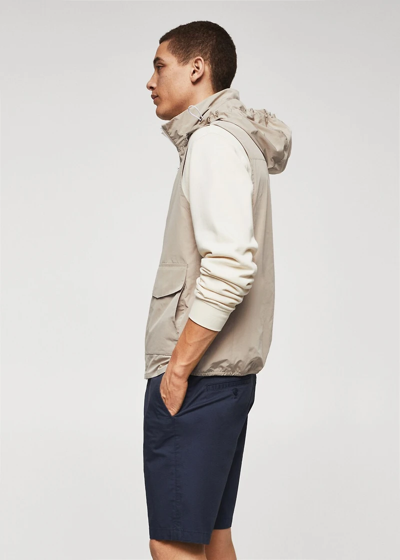 Water-repellent vest with hood