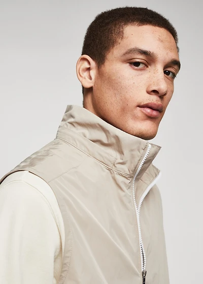 Water-repellent vest with hood