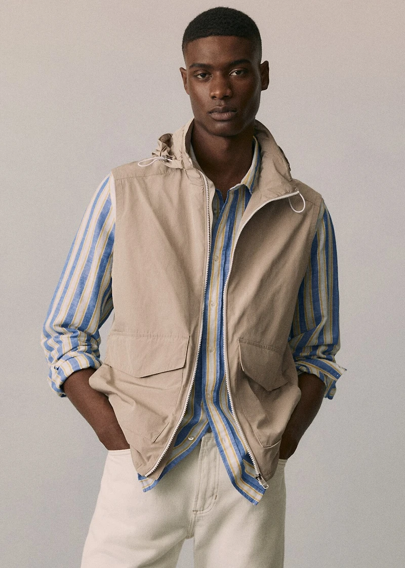 Water-repellent vest with hood