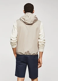 Water-repellent vest with hood