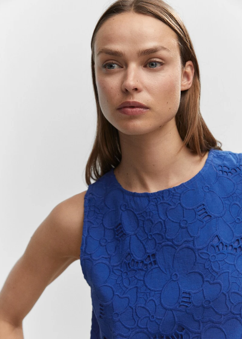 Embroidered blouse with lace accents