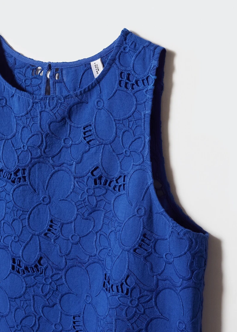 Embroidered blouse with lace accents