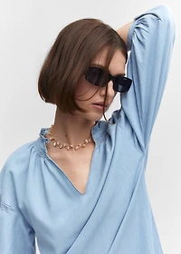 Puffed-sleeved dress will frills