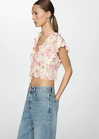 Floral blouse with bow closure