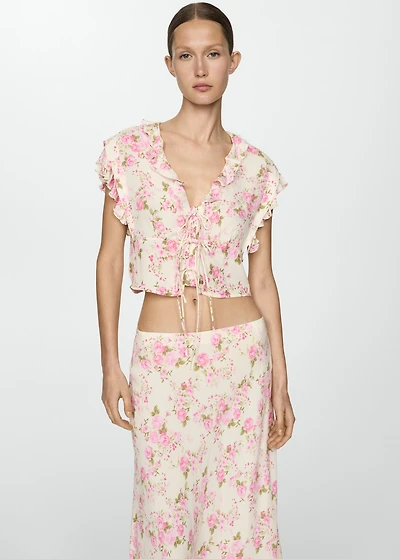 Floral blouse with bow closure